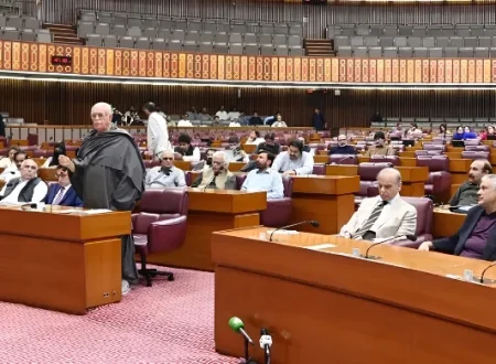 Members of the National Assembly of Pakistan seated during the Budget 2026–27 session as Finance Minister Muhammad Aurangzeb presents the federal budget in Parliament.