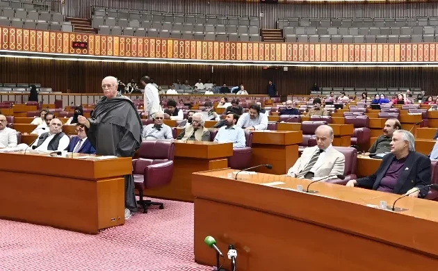 Members of the National Assembly of Pakistan seated during the Budget 2026–27 session as Finance Minister Muhammad Aurangzeb presents the federal budget in Parliament.