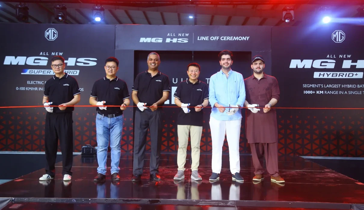 MG Pakistan officials holding a ribbon-cutting ceremony for the CKD line-off of the All New MG HS Hybrid+ and Super Hybrid vehicles.