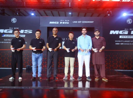 MG Pakistan officials holding a ribbon-cutting ceremony for the CKD line-off of the All New MG HS Hybrid+ and Super Hybrid vehicles.