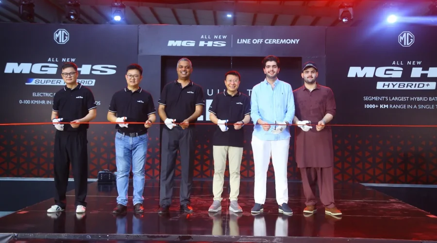 MG Pakistan officials holding a ribbon-cutting ceremony for the CKD line-off of the All New MG HS Hybrid+ and Super Hybrid vehicles.