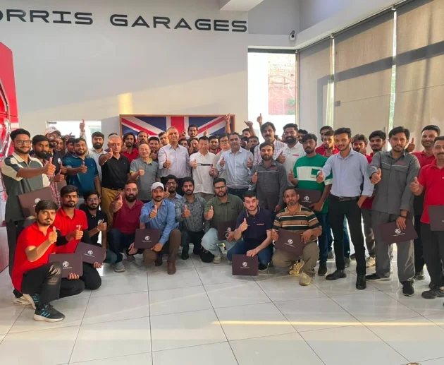 MG Motor Pakistan dealership technicians receiving hands-on hybrid vehicle battery training as part of nationwide after-sales readiness for MG HS Hybrid+ and MG HS Super Hybrid.