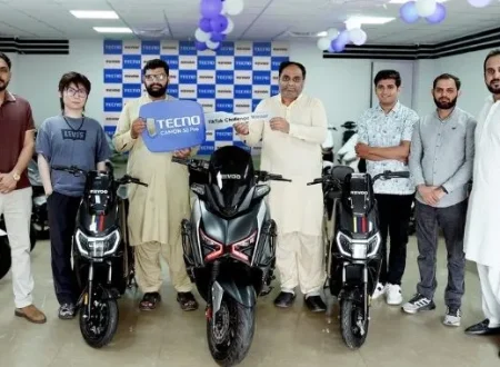 TECNO Pakistan TikTok Challenge winners receive REVOO electric bikes at the CAMON 50 Series event.