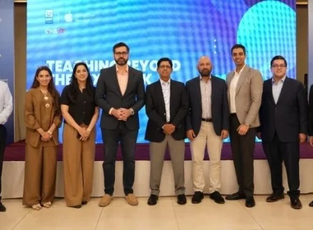 DWP Technologies and GNEXT representatives at the Teaching Beyond the Textbook event in Lahore, promoting digital learning, Apple technology and modern education solutions in Pakistan.