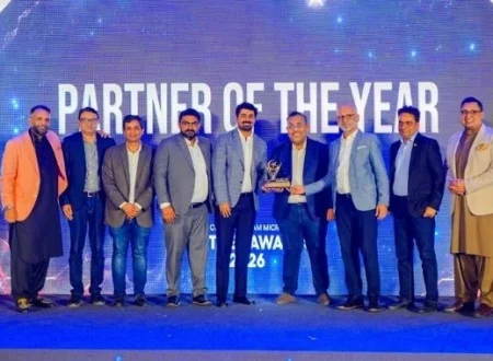 DWP Technologies team receives the Partner of the Year award at the Cisco Partner Awards FY 2025–26 in Karachi.